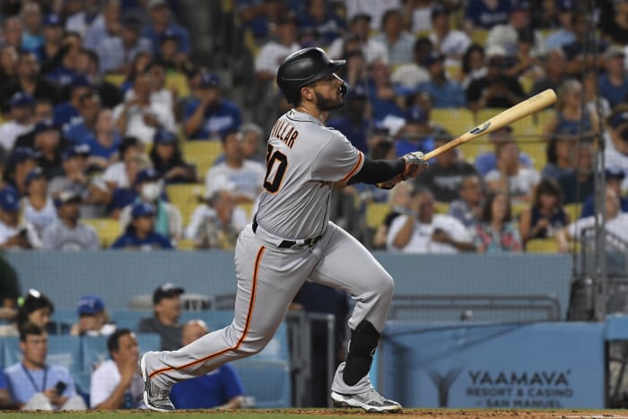 SF Giants infielder David Villar watches a ball after hitting a homer against the Dodgers. (2022)